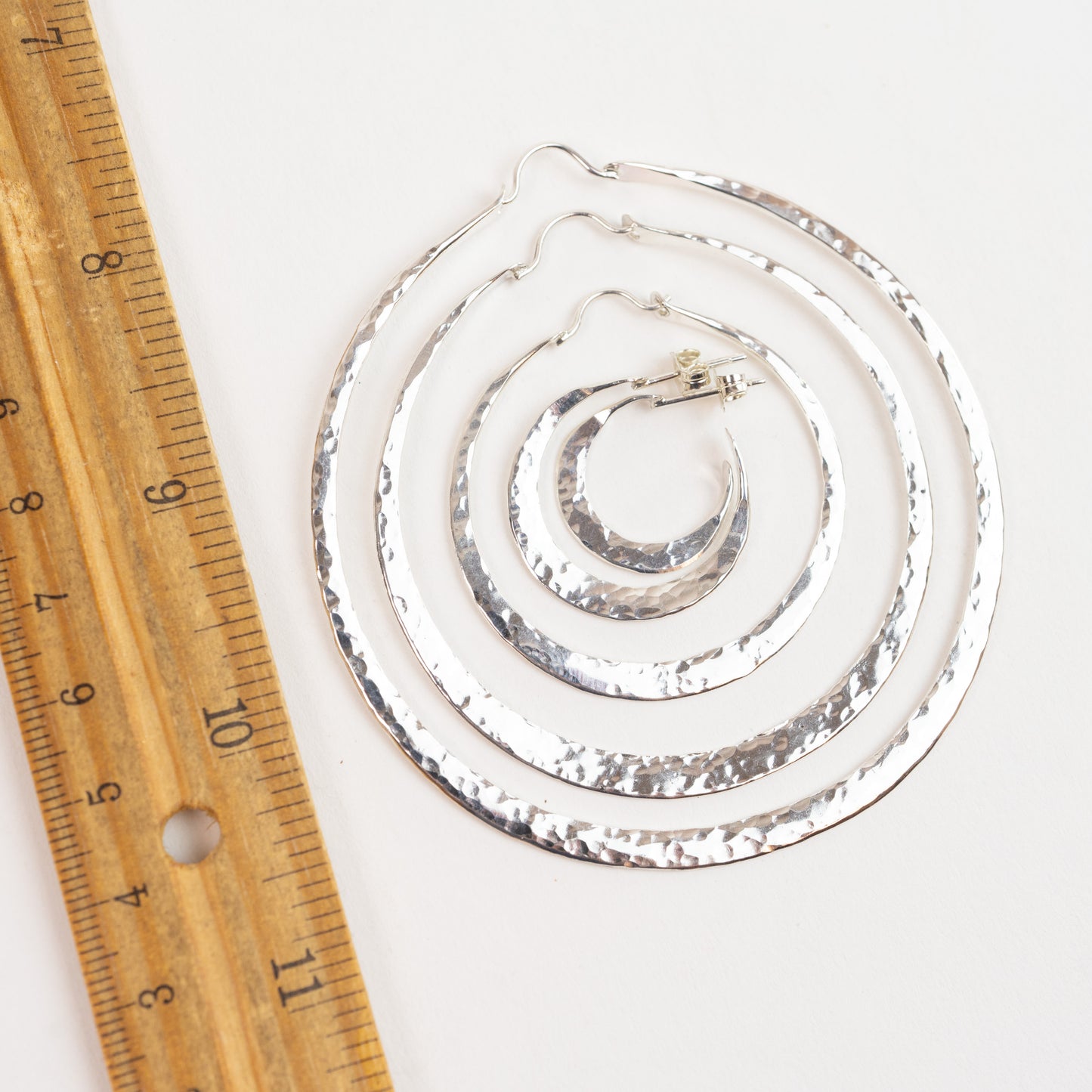 Hoops - Our Collection of Sterling Silver XXXL - 3", large 2-1/4", and medium 1.80", . Also small and large post hoop earrings! Worn everyday with every outfit.