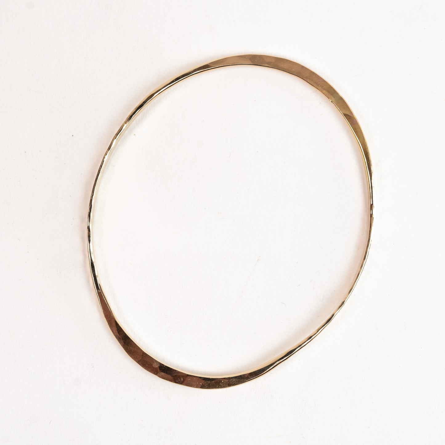 Bangle bracelet - 14k Solid Yellow Gold - hand forged into an oval - Light 12 gauge